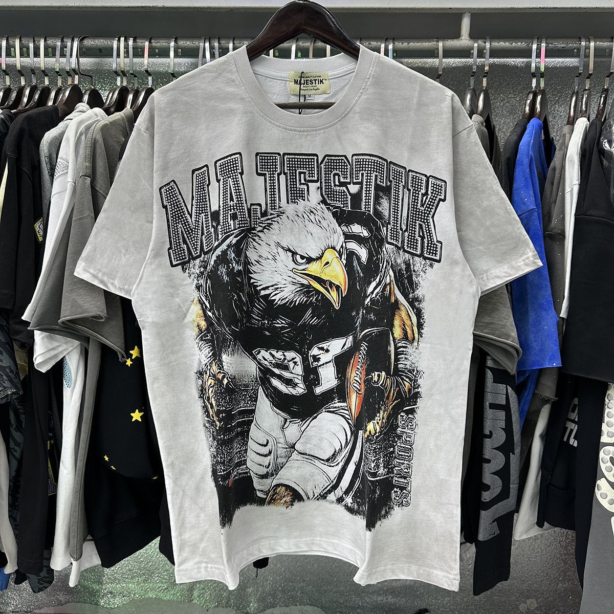 MAJESTIK Eagle Football Rhinestone Graphic T-Shirt