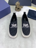 Dior Logo-Pattern Canvas Slip-On Sneakers - Black and White